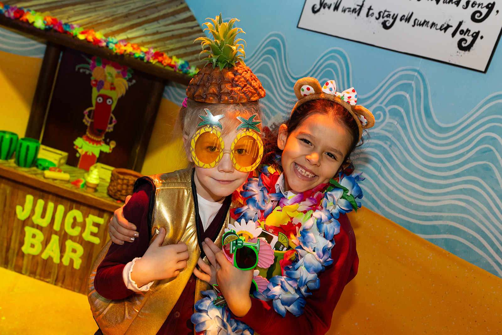 Two young children dressed up in the 100 Story Hotel