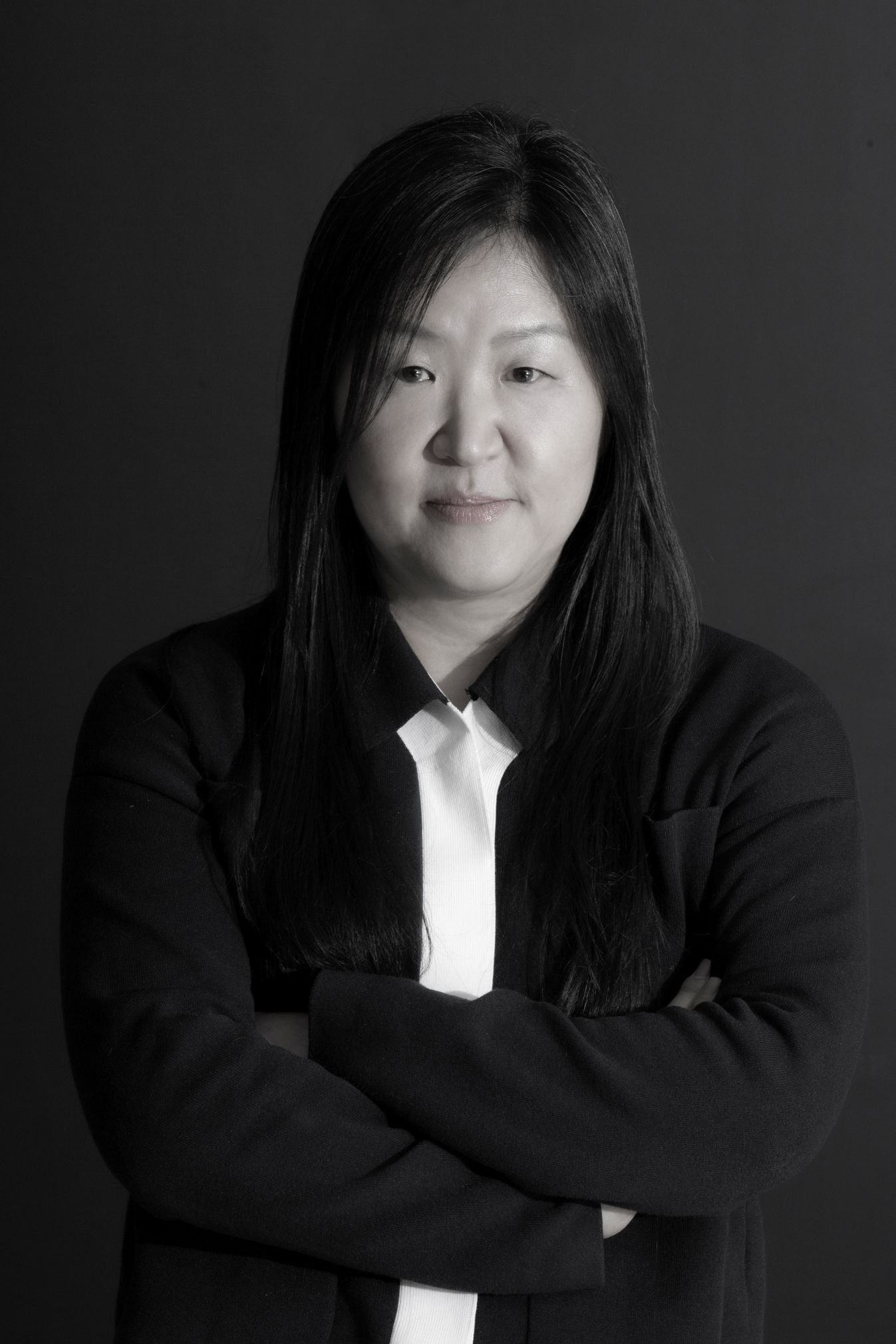 Headshot of host Sook-Kyung Lee